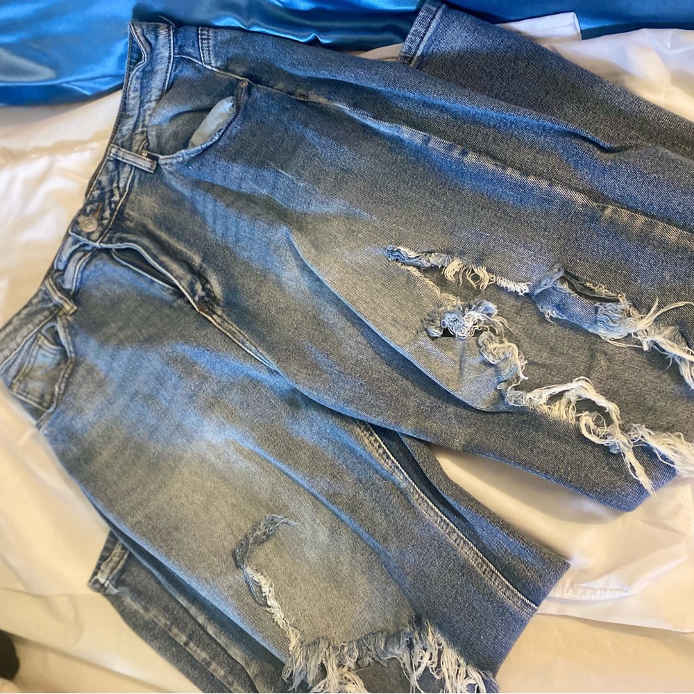 Distressed Blue Jeans